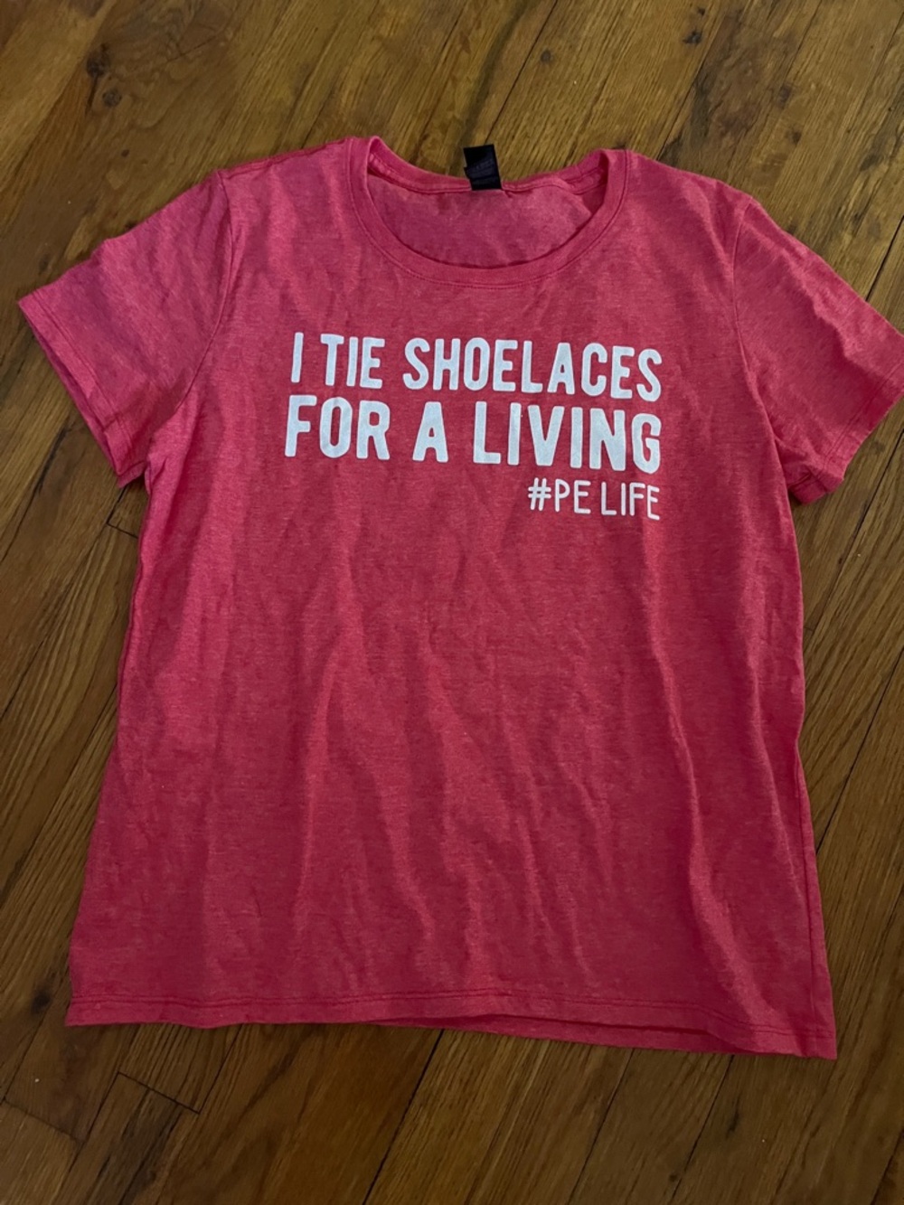 Red Graphic Tee "I Tie Shoelaces For A Living"